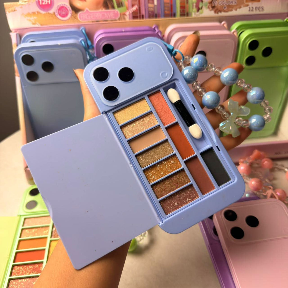 IPhone 17 Pro Max Style Eyeshadow Palette With Hand Band - The Effect Online