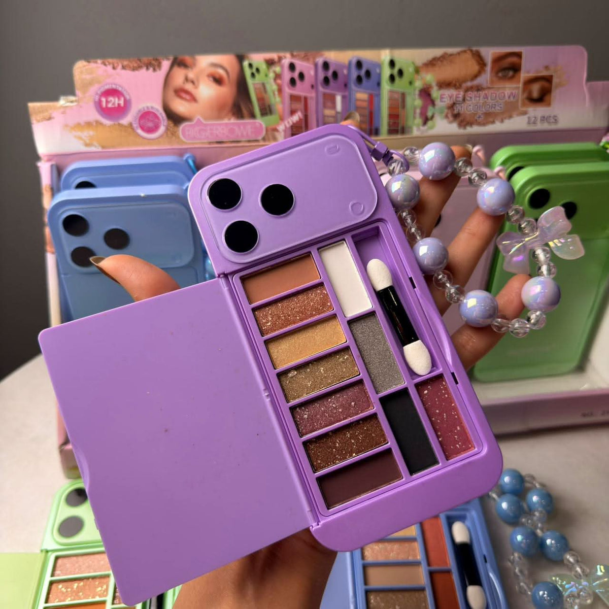 IPhone 17 Pro Max Style Eyeshadow Palette With Hand Band - The Effect Online